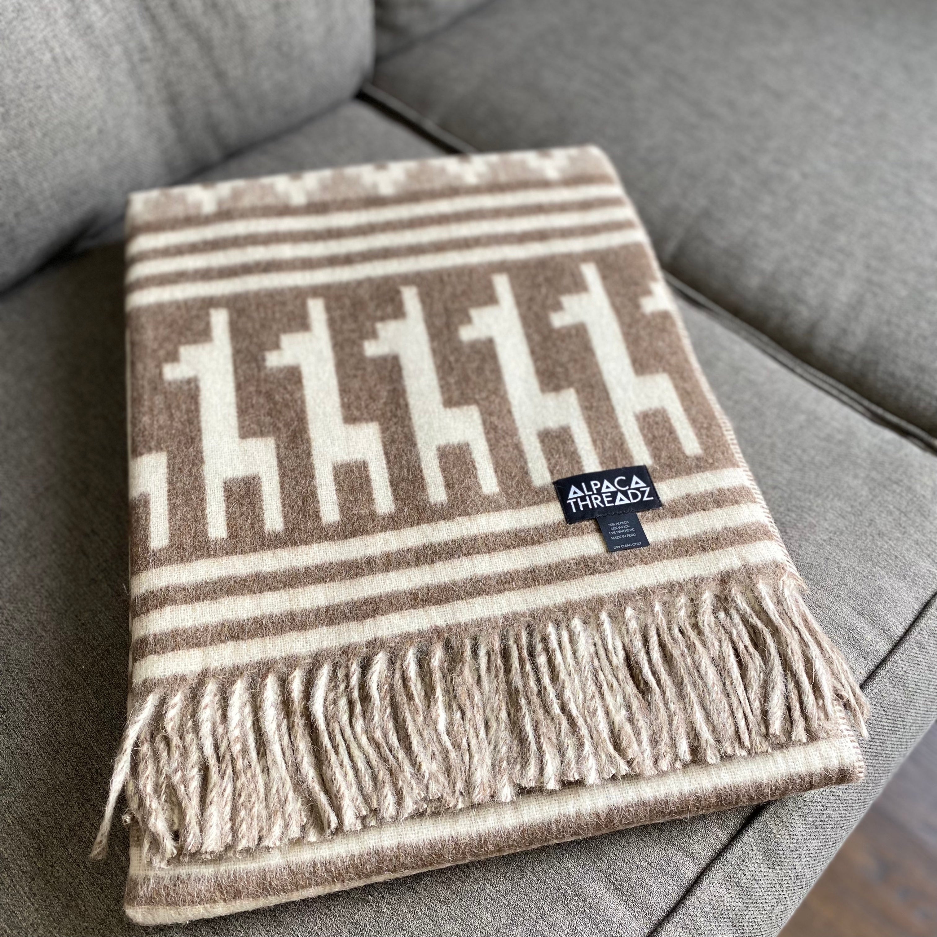 Peruvian alpaca throw with alpaca motif, view 7