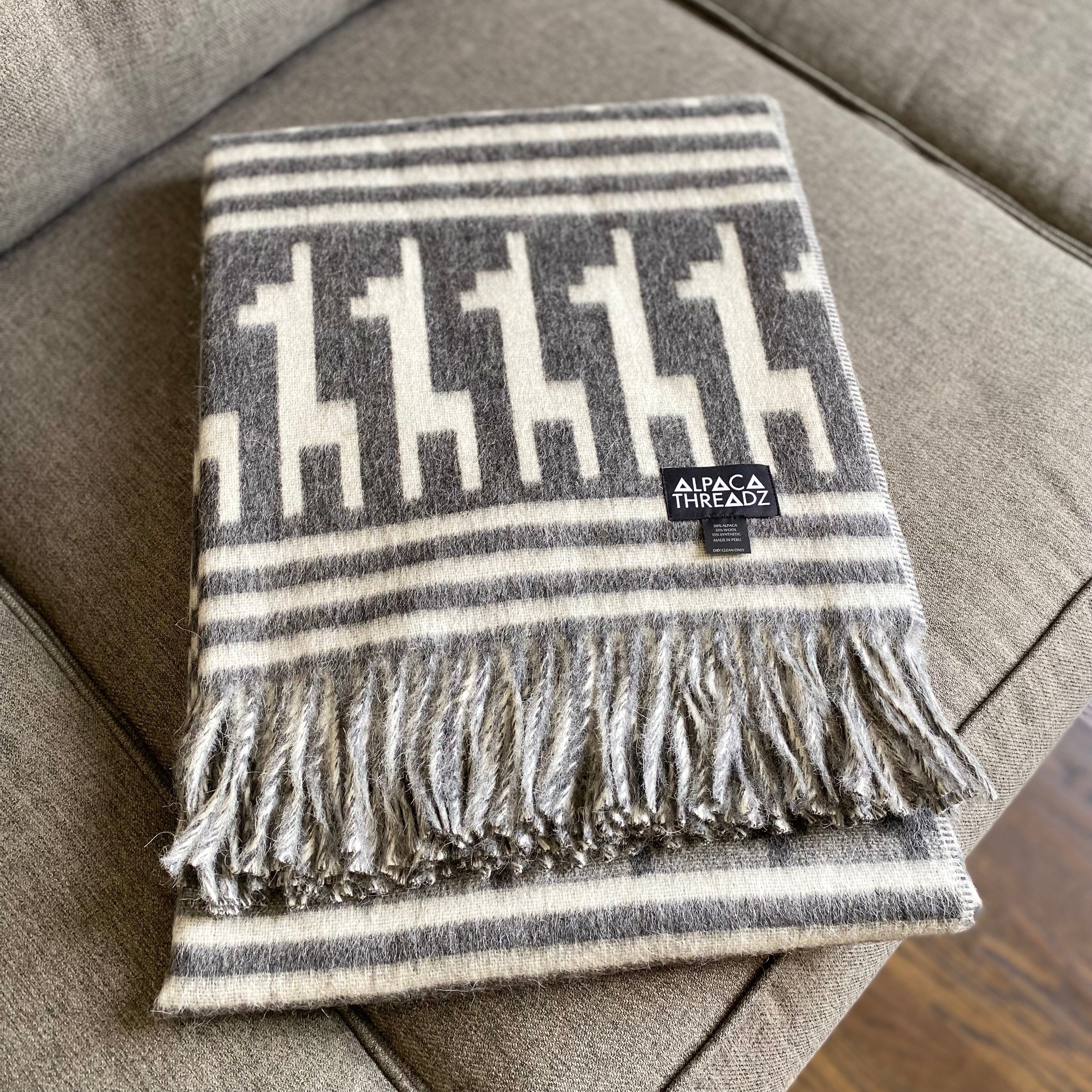 Peruvian alpaca throw with alpaca motif, view 10