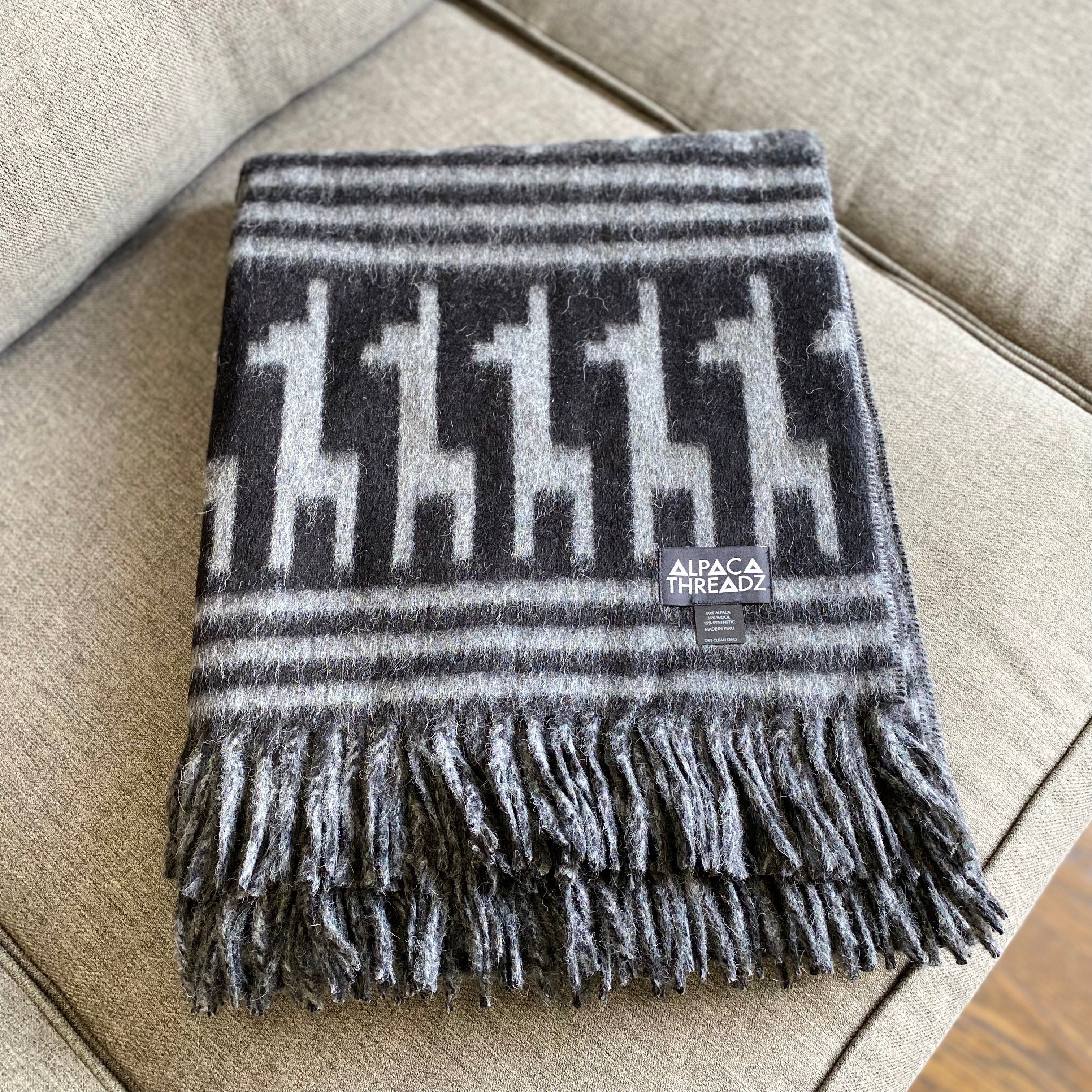 Peruvian alpaca throw with alpaca motif, view 11