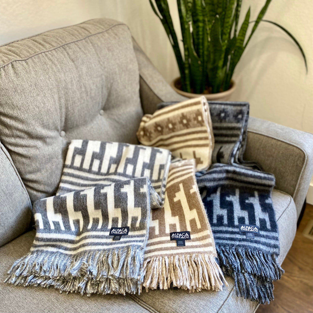 Peruvian alpaca throw with alpaca motif, view 2