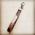 Tan steer embossed leather wristlet key chain with a swivel clip