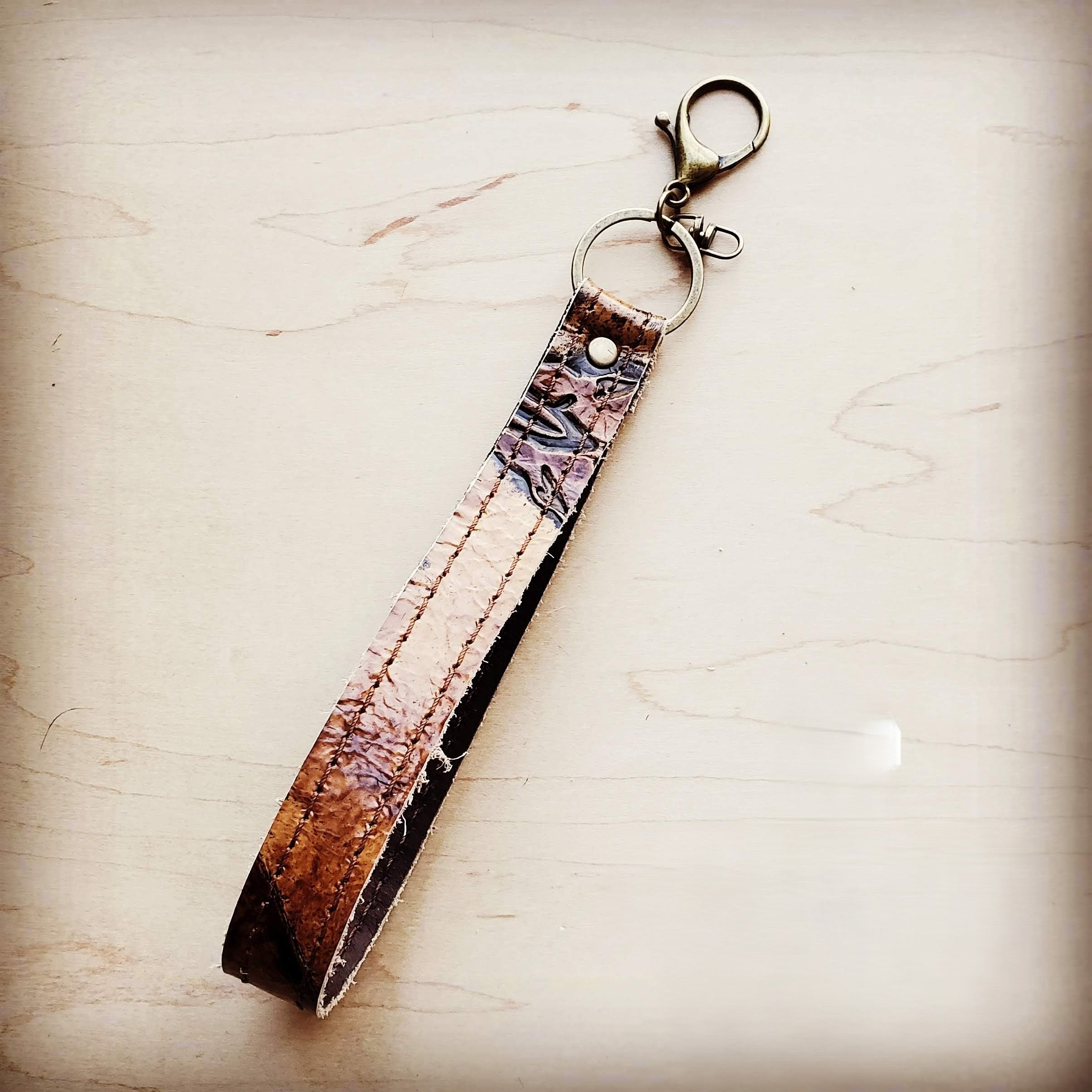 Tan steer embossed leather wristlet key chain with a swivel clip