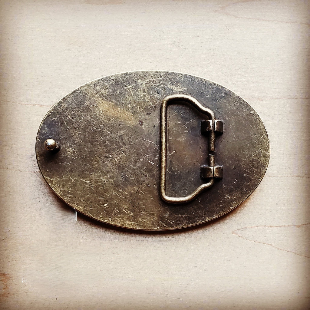Rope edge belt buckle in white spotted hair on hide, third view