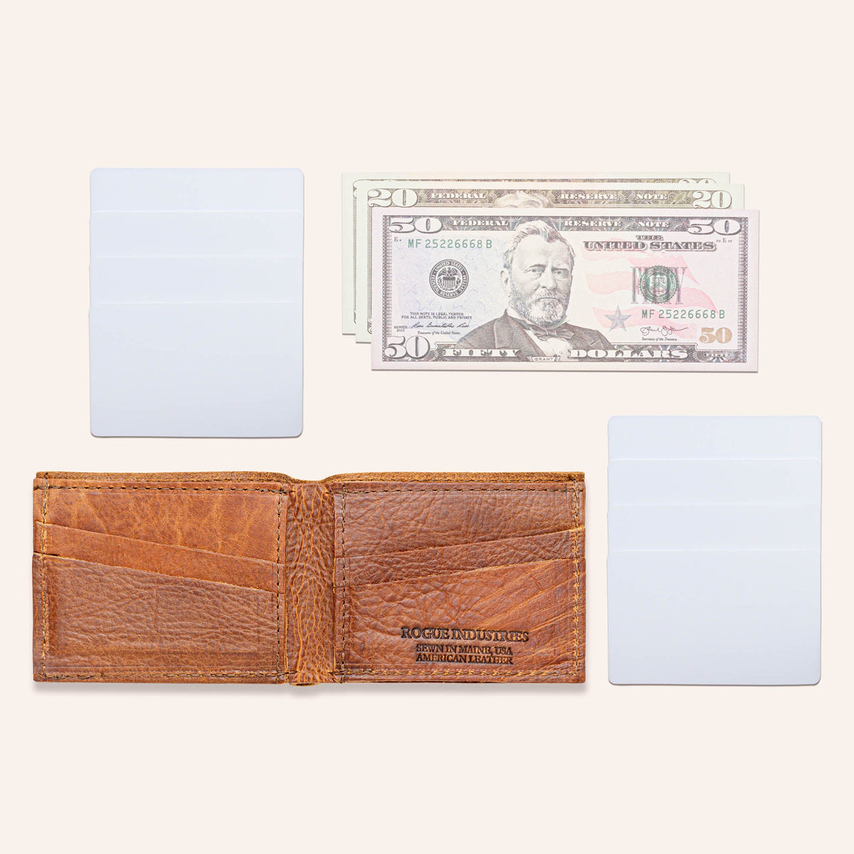 Heritage brown bison leather wallet with cards laid out beside it