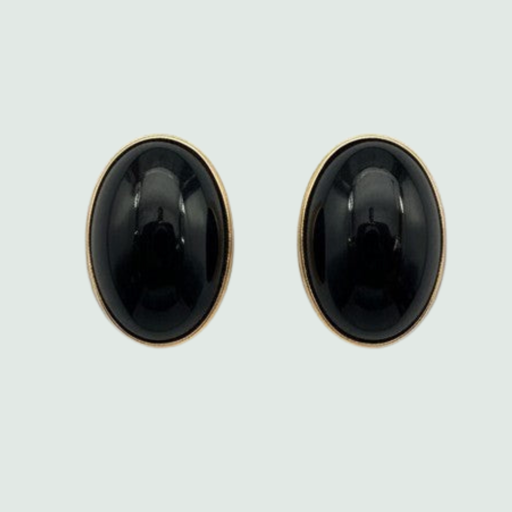 Black Onyx Oval Stud Earrings in Solid 14K Gold, shown on a sage mist background
