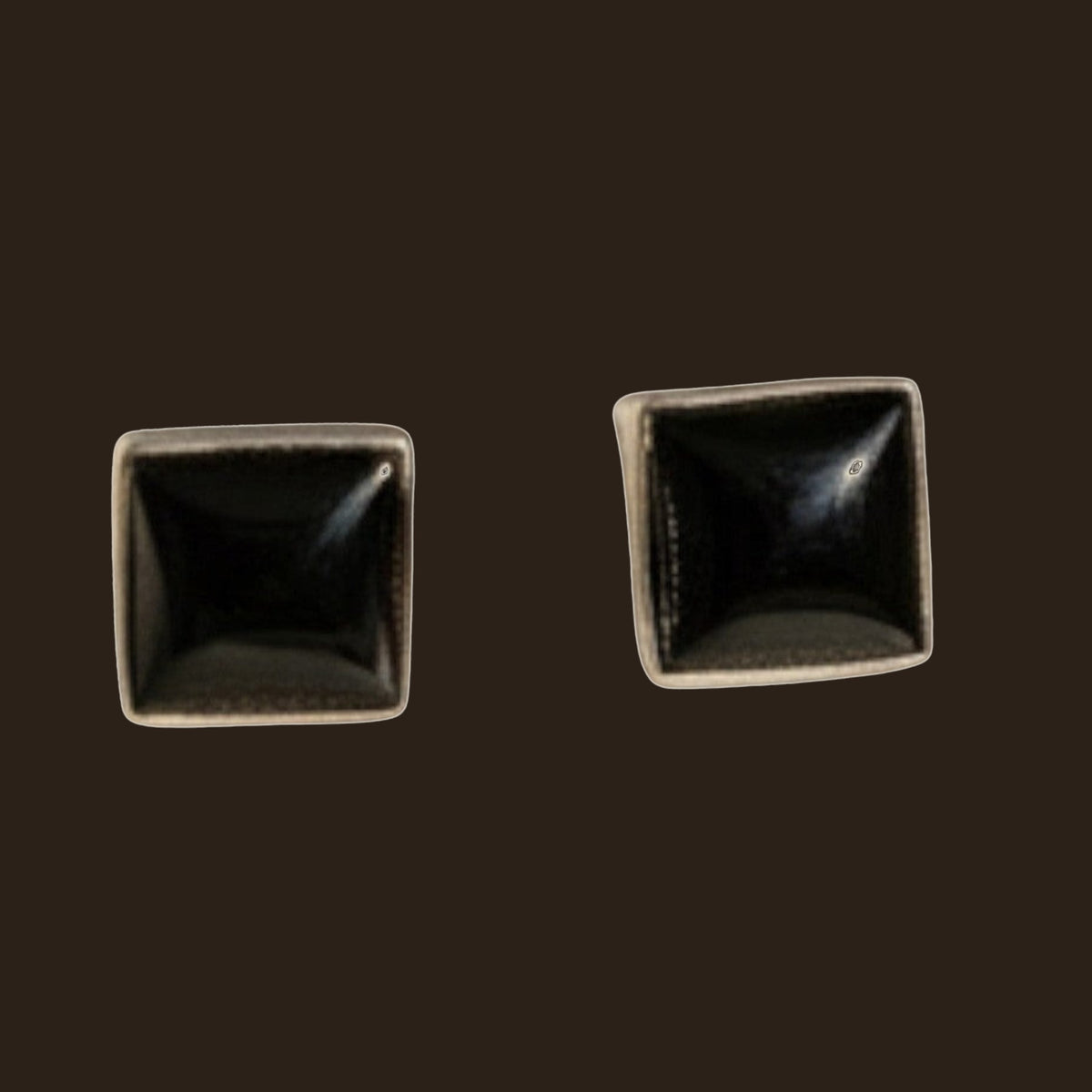 Black Onyx Square Stud Earrings in Sterling Silver, shown on an espresso background