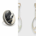White Buffalo statement ring and sterling silver leaf dangle earrings set, shown side by side