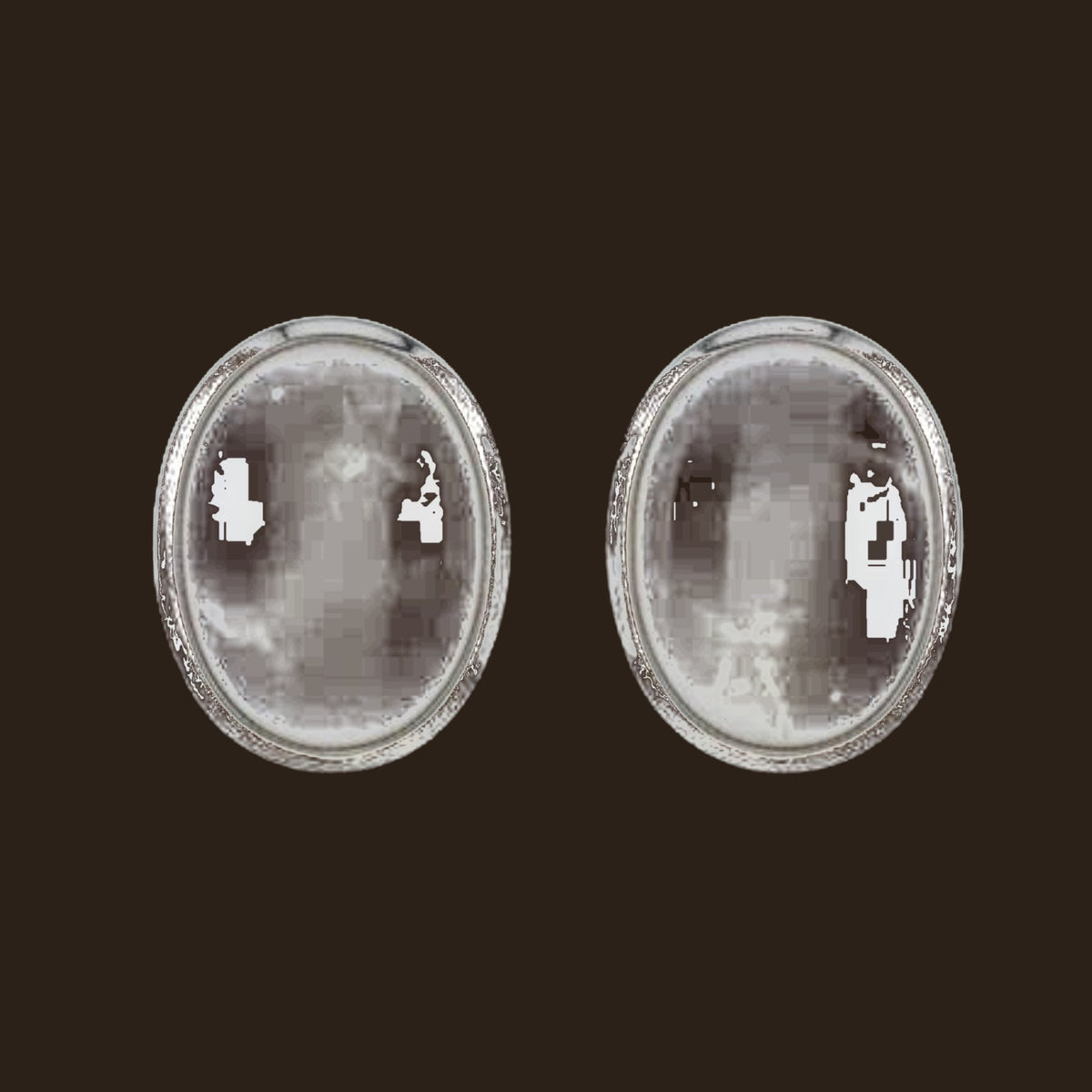 Cream Mother of Pearl Oval Stud Earrings in Sterling Silver, shown on an espresso background