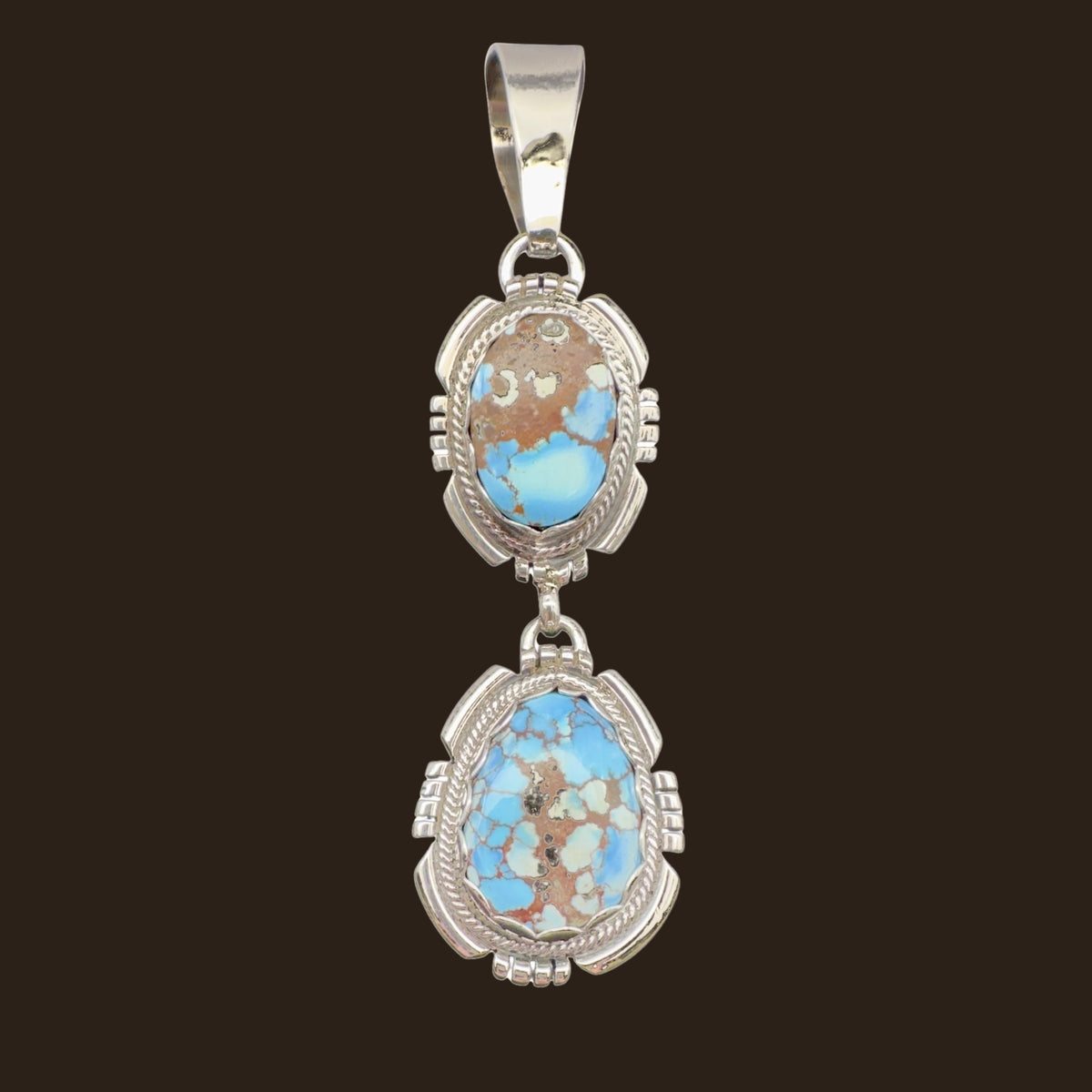 Golden Hills Turquoise Pendant Necklace in Navajo Sterling Silver, by Randy Billy, shown on an espresso background