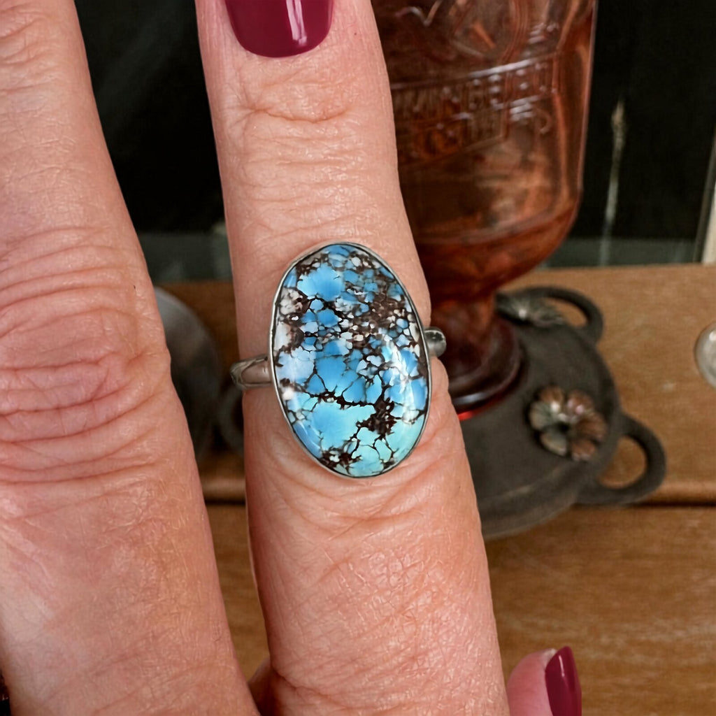 Golden Hills turquoise ring in sterling silver worn on a finger, size 7