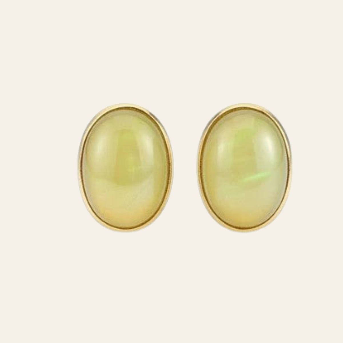 Golden Opal Stud Earrings in Solid 14K Gold, shown on a cream background
