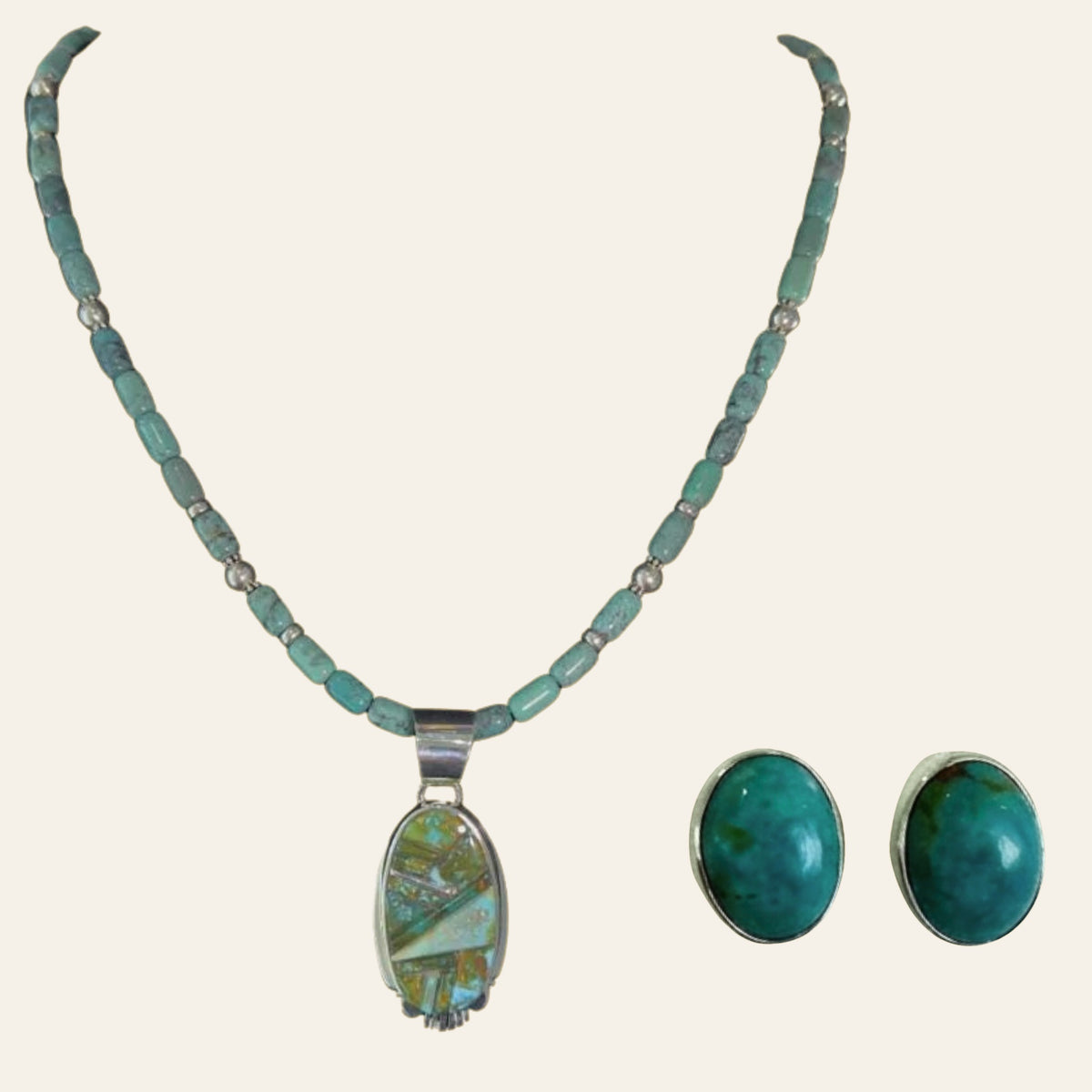 Green Turquoise Pendant and Oval Stud Earrings in Sterling Silver (SET), shown on a cream background