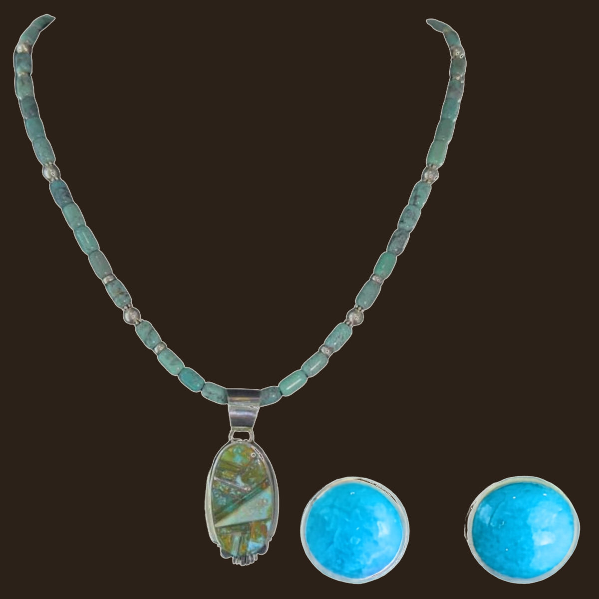 Green Turquoise Pendant and Turquoise Stud Earrings Set in Sterling Silver, shown on an espresso background