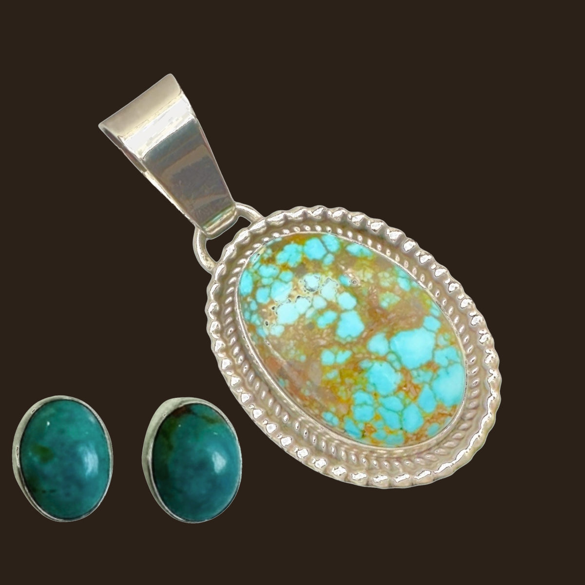 Kingman Red Web Turquoise Pendant and Oval Stud Earrings in Sterling Silver (SET), shown on an espresso background