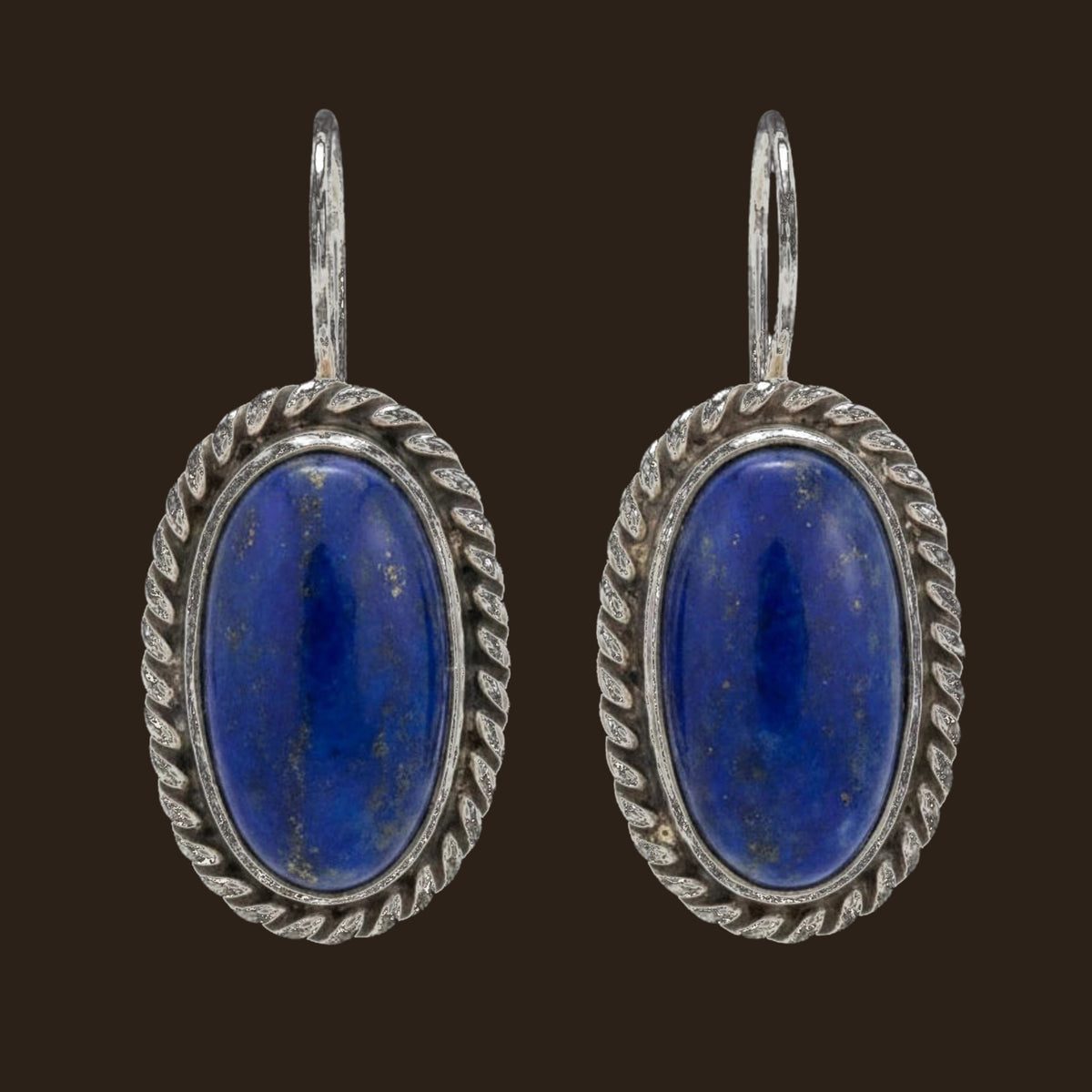 Lapis Lazuli Earrings, Oval Drops in Sterling Silver with Twisted Rope Border, shown on an espresso background