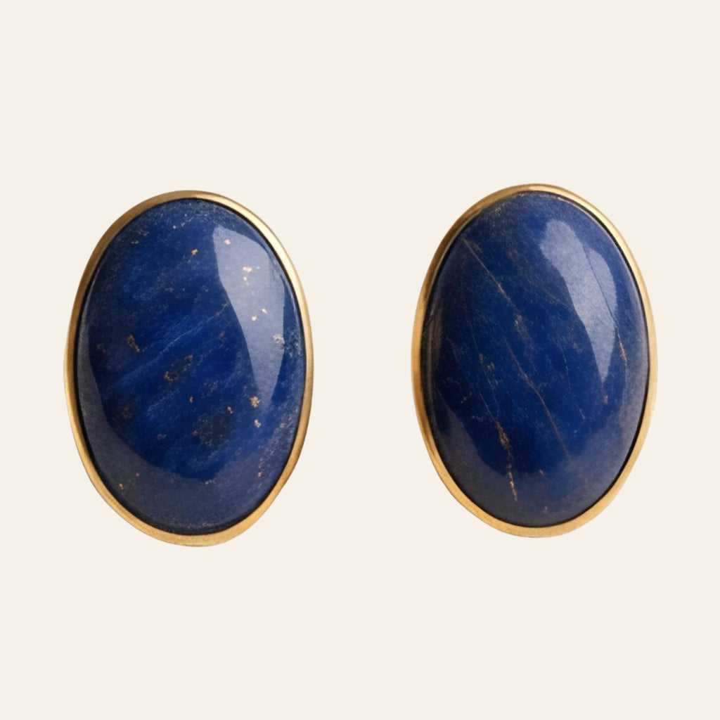 Lapis Lazuli Oval Stud Earrings in Solid 14K Gold, shown on a cream background