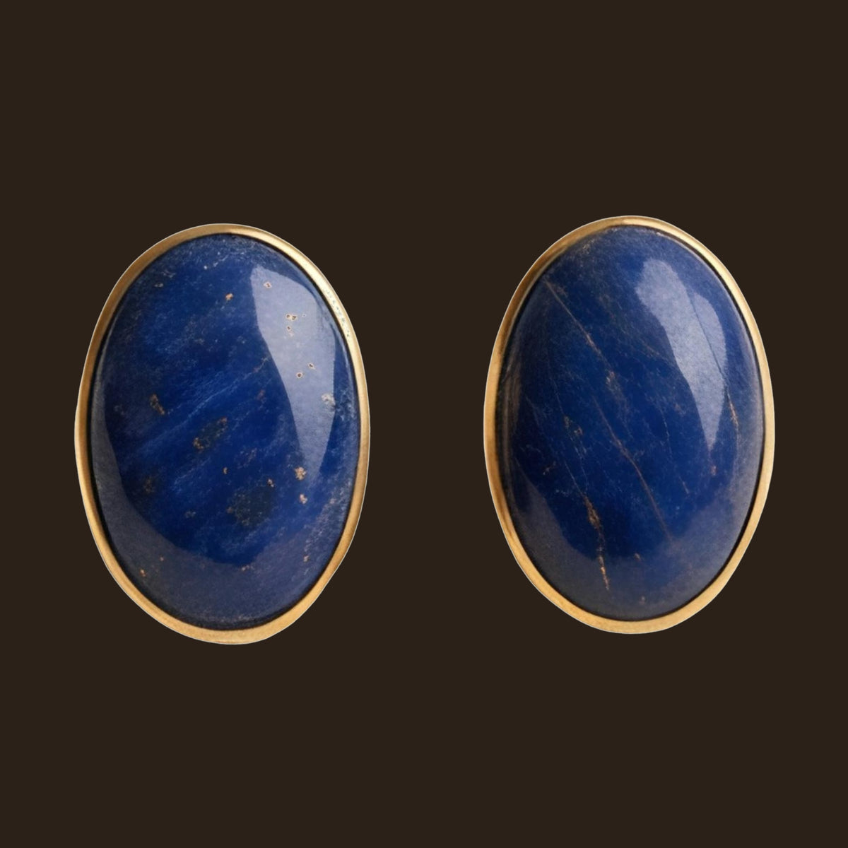 Lapis Lazuli Oval Stud Earrings in Solid 14K Gold, shown on an espresso background
