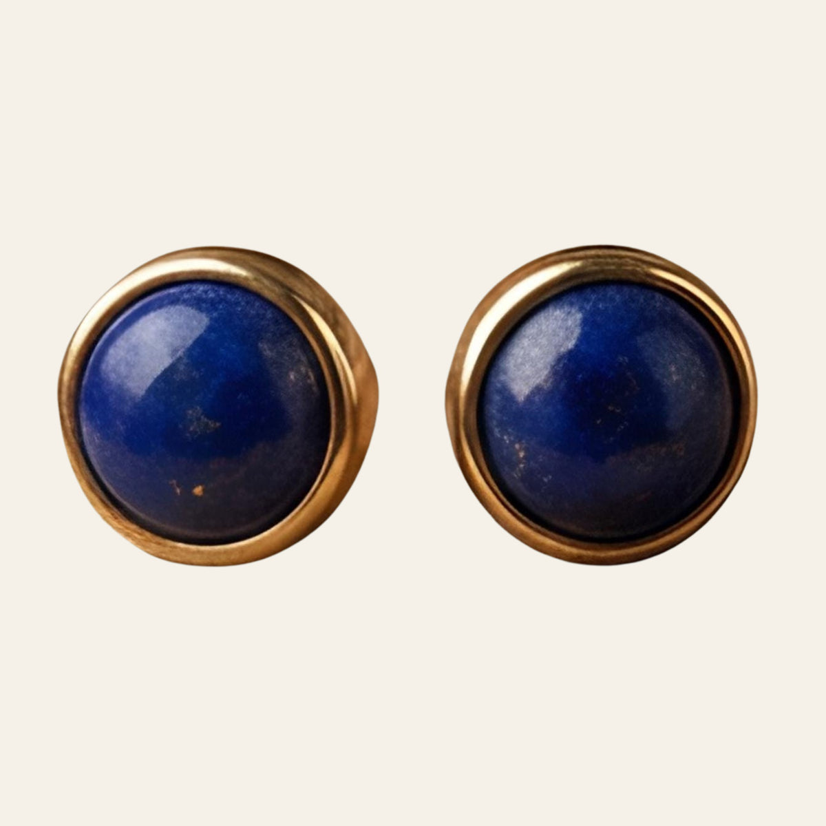 Lapis Lazuli Round Mini Stud Earrings in Sterling Silver or 14K Gold, shown on a cream background