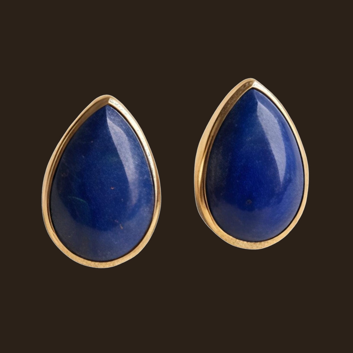 Lapis Lazuli Teardrop Stud Earrings in Solid 14K Gold, shown on an espresso background