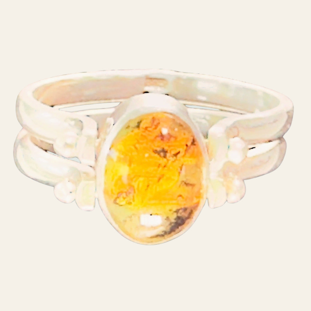 Larimar and Amber Reversible Flip Ring in Sterling Silver, shown on a cream background