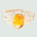 Larimar and Amber Reversible Flip Ring in Sterling Silver, shown on a sage mist background