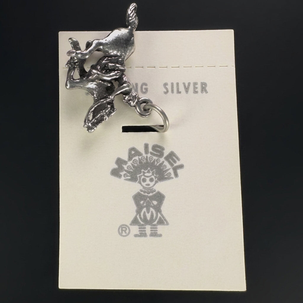 Reverse of the vintage Maisel's sterling silver bucking bronco charm