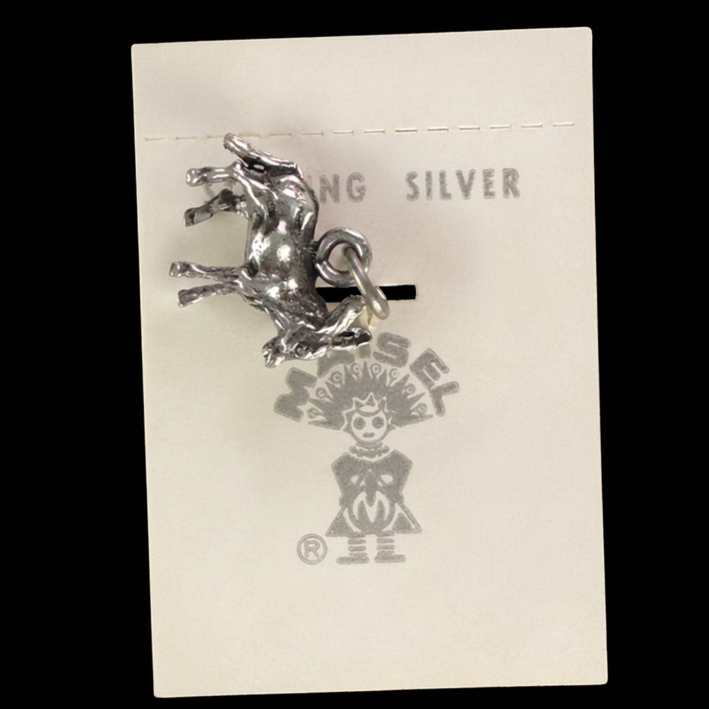 Reverse of the vintage Maisel's sterling silver burro charm