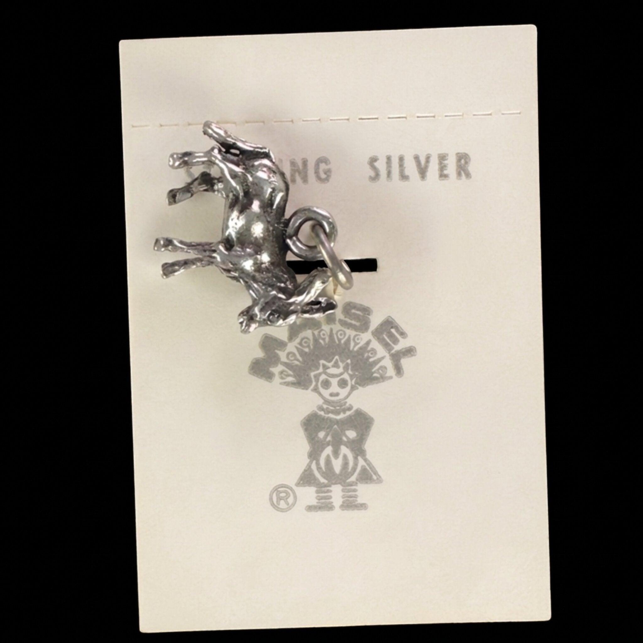 Reverse of the vintage Maisel's sterling silver burro charm