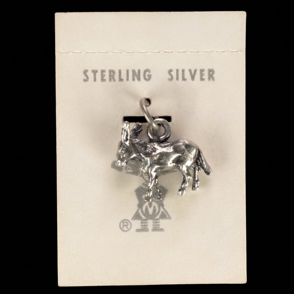 Vintage Maisel's sterling silver burro charm on its original trading post card