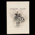 Vintage Maisel's sterling silver burro charm on its original trading post card