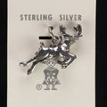 Vintage Maisel's sterling silver leaping elk charm on its original trading post card
