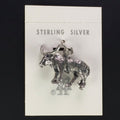 Vintage Maisel's sterling silver longhorn charm on its original trading post card