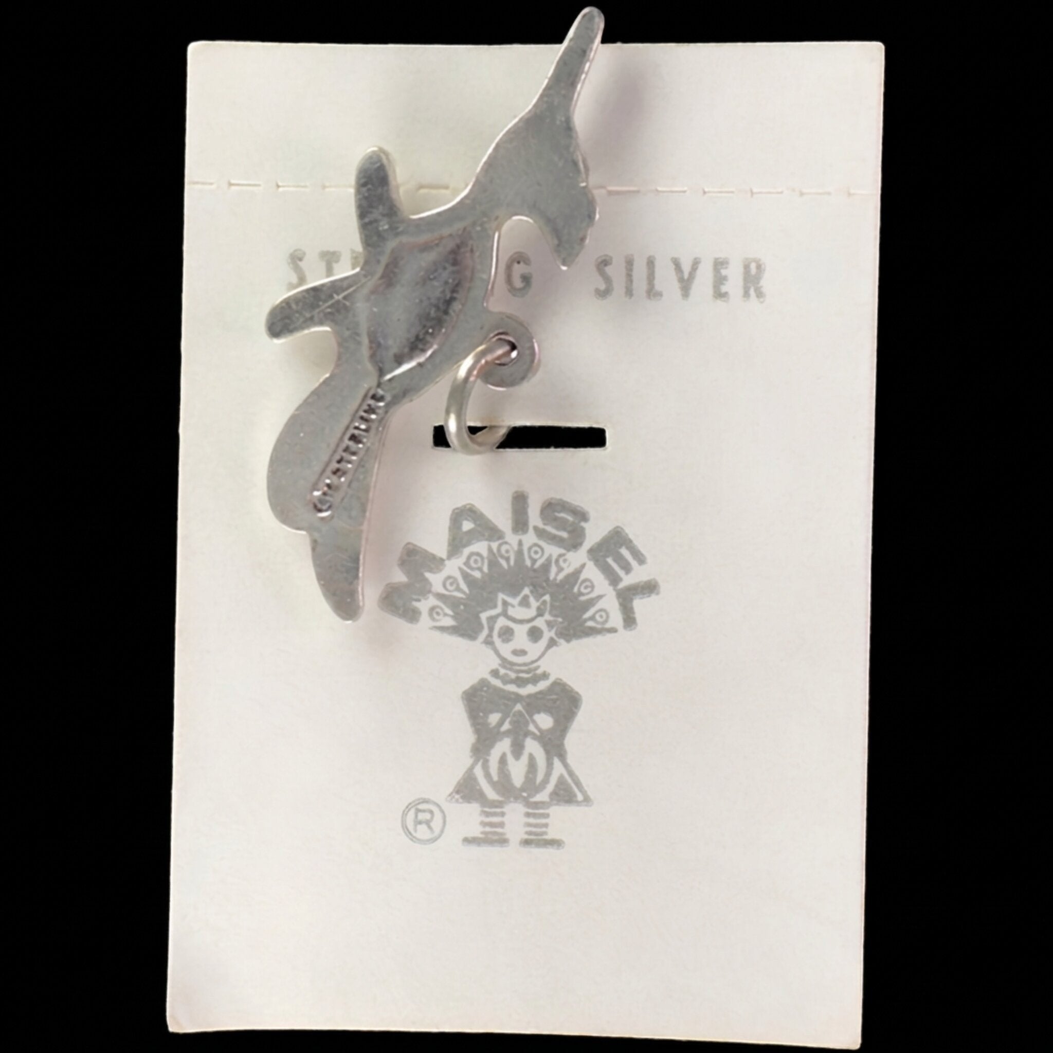 Reverse of the vintage Maisel's sterling silver roadrunner charm with turquoise eye