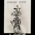 Vintage Maisel's sterling silver skier charm on its original trading post card