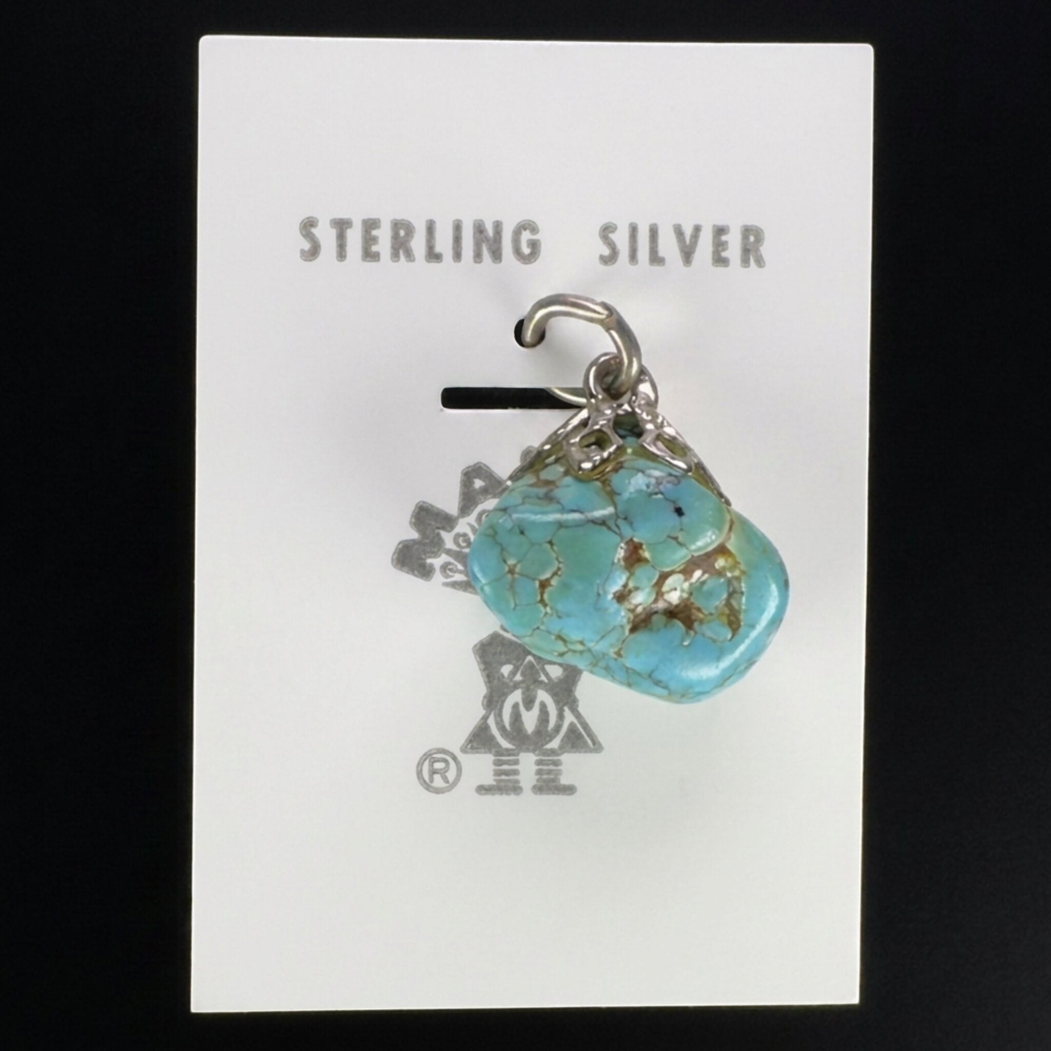 Vintage Maisel's spiderweb turquoise nugget pendant on its original trading post card