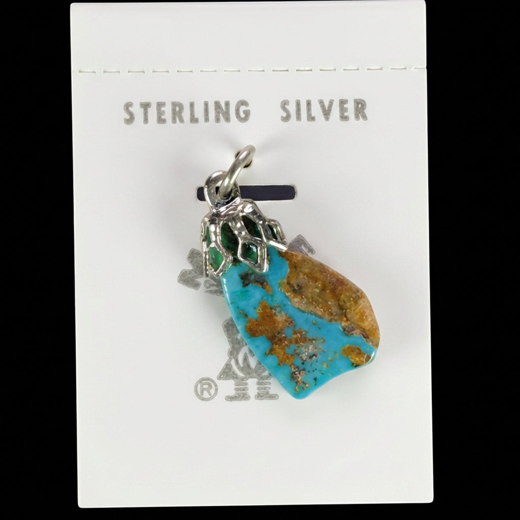 Vintage Maisel's natural turquoise nugget pendant with brown matrix on its original trading post card