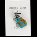 Vintage Maisel's natural turquoise nugget pendant with brown matrix on its original trading post card