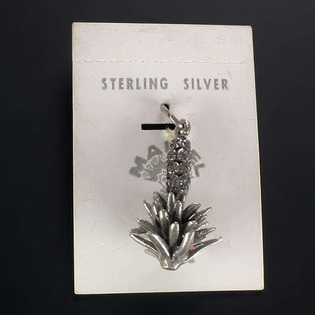 Vintage Maisel's sterling silver yucca charm, New Mexico's state flower, on its original trading post card