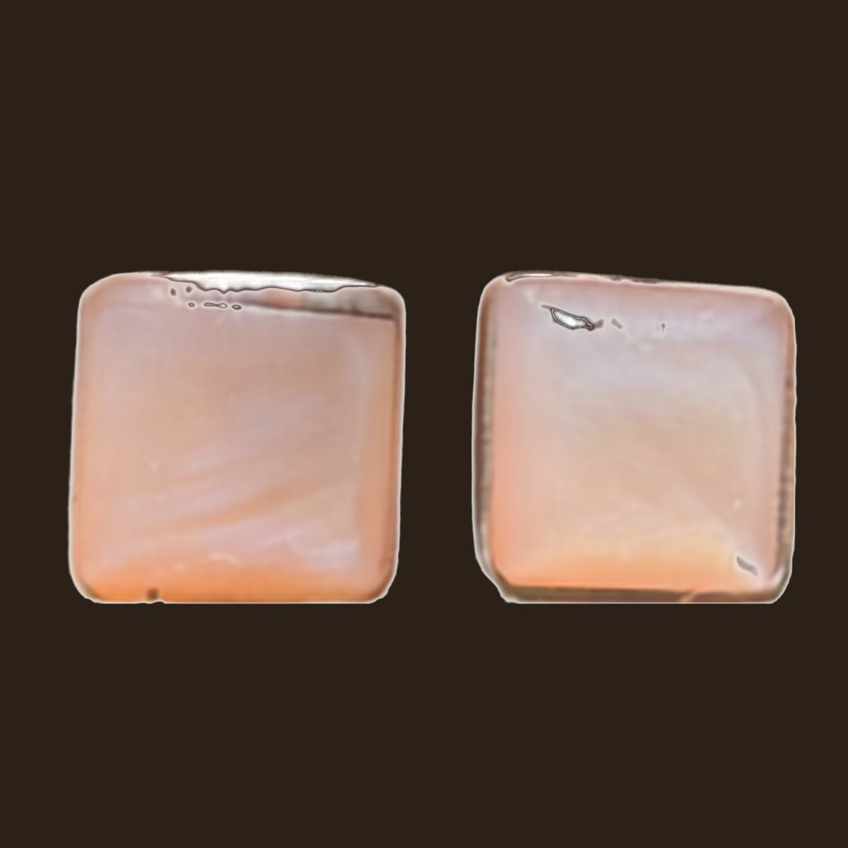 Mother of Pearl Square Stud Earrings in Sterling Silver, shown on an espresso background