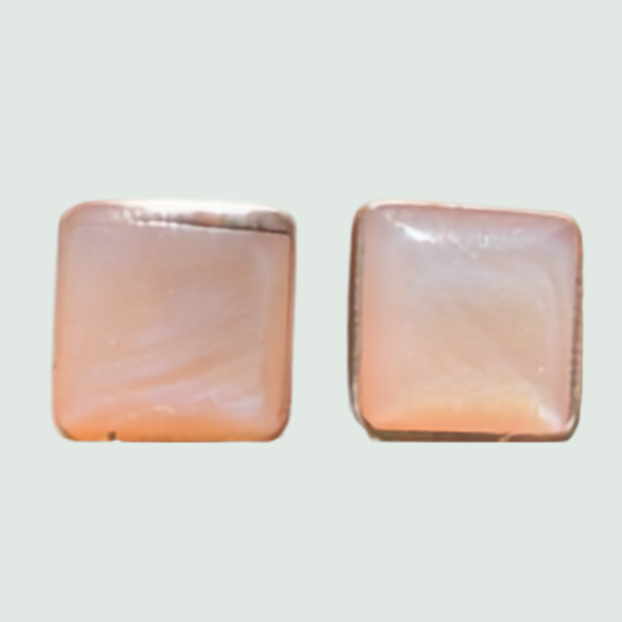 Mother of Pearl Square Stud Earrings in Sterling Silver, shown on a sage mist background
