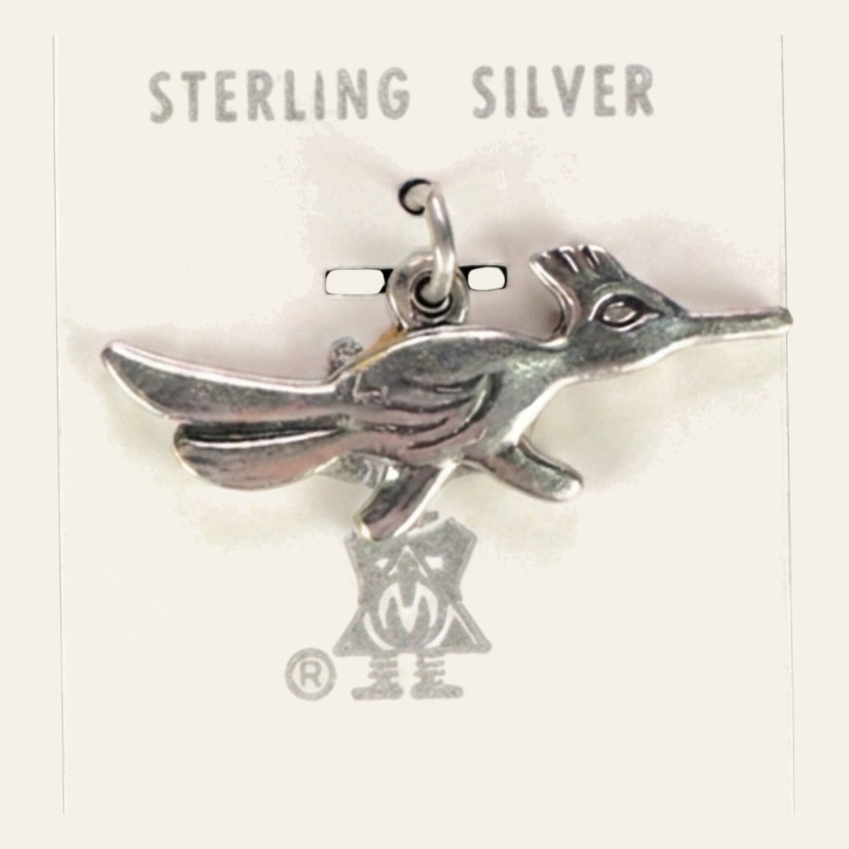 Roadrunner Charm in Sterling Silver, Vintage Maisel's New Old Stock, shown on a cream background