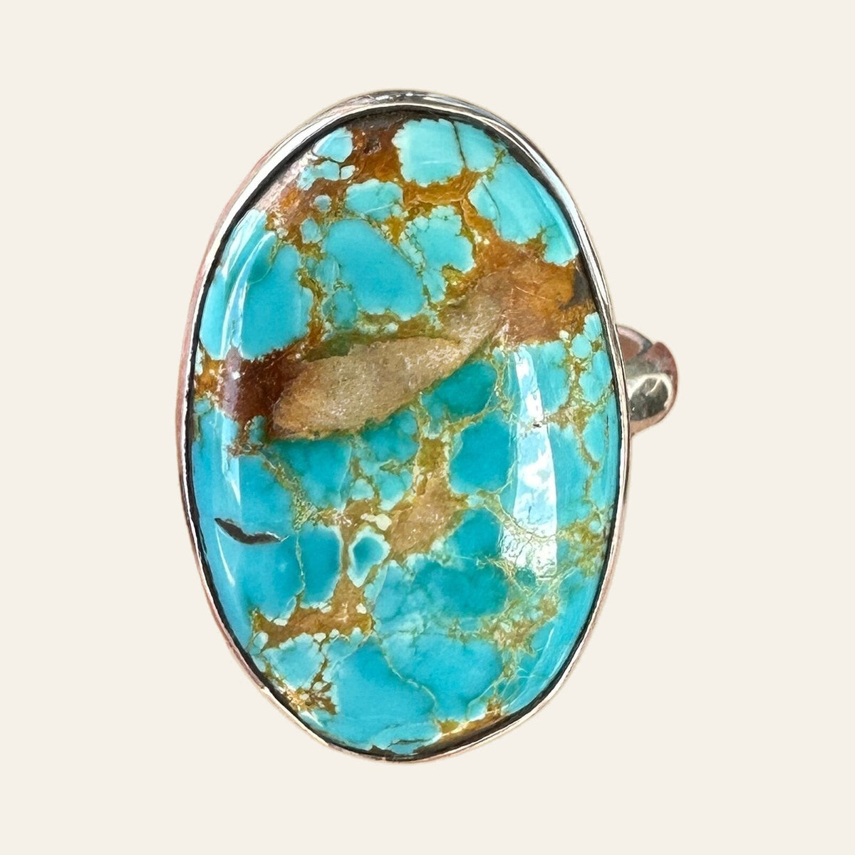 Royston Turquoise Ring in Sterling Silver, Size 7.5, shown on a cream background