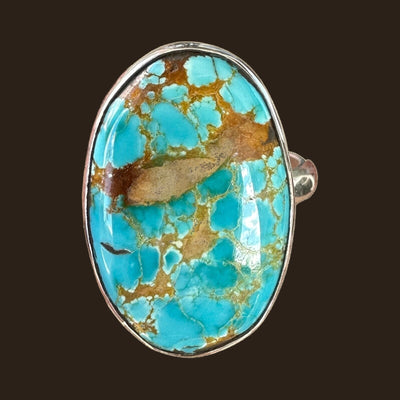 Royston Turquoise Ring in Sterling Silver, Size 7.5, shown on an espresso background