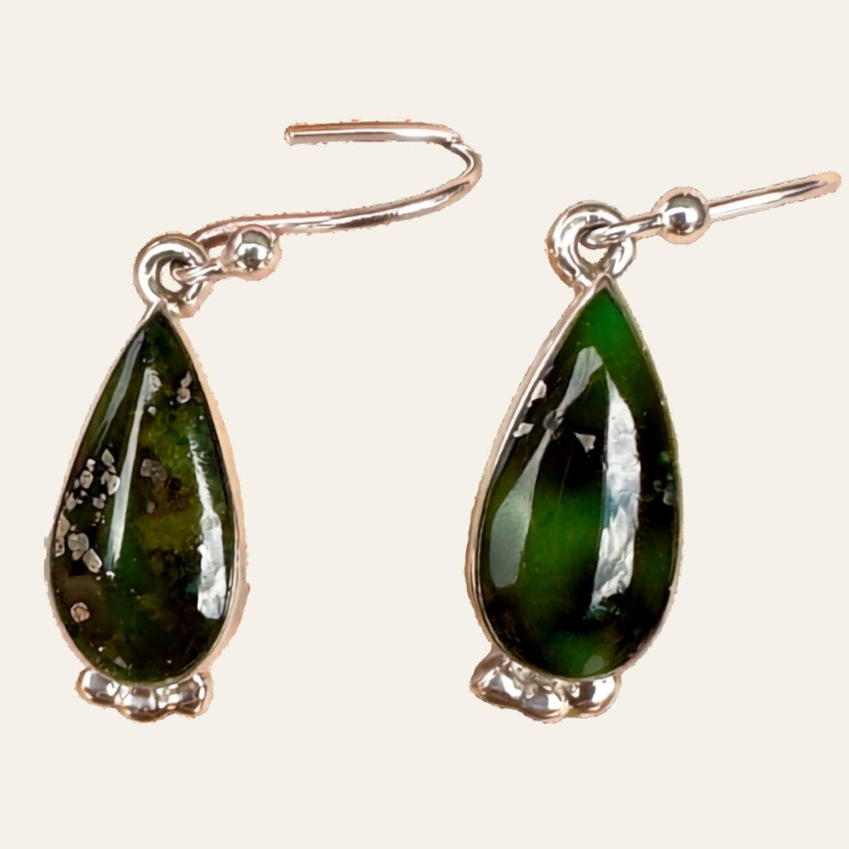 Sonoran Mountain Turquoise Teardrop Earrings in Sterling Silver, shown on a cream background