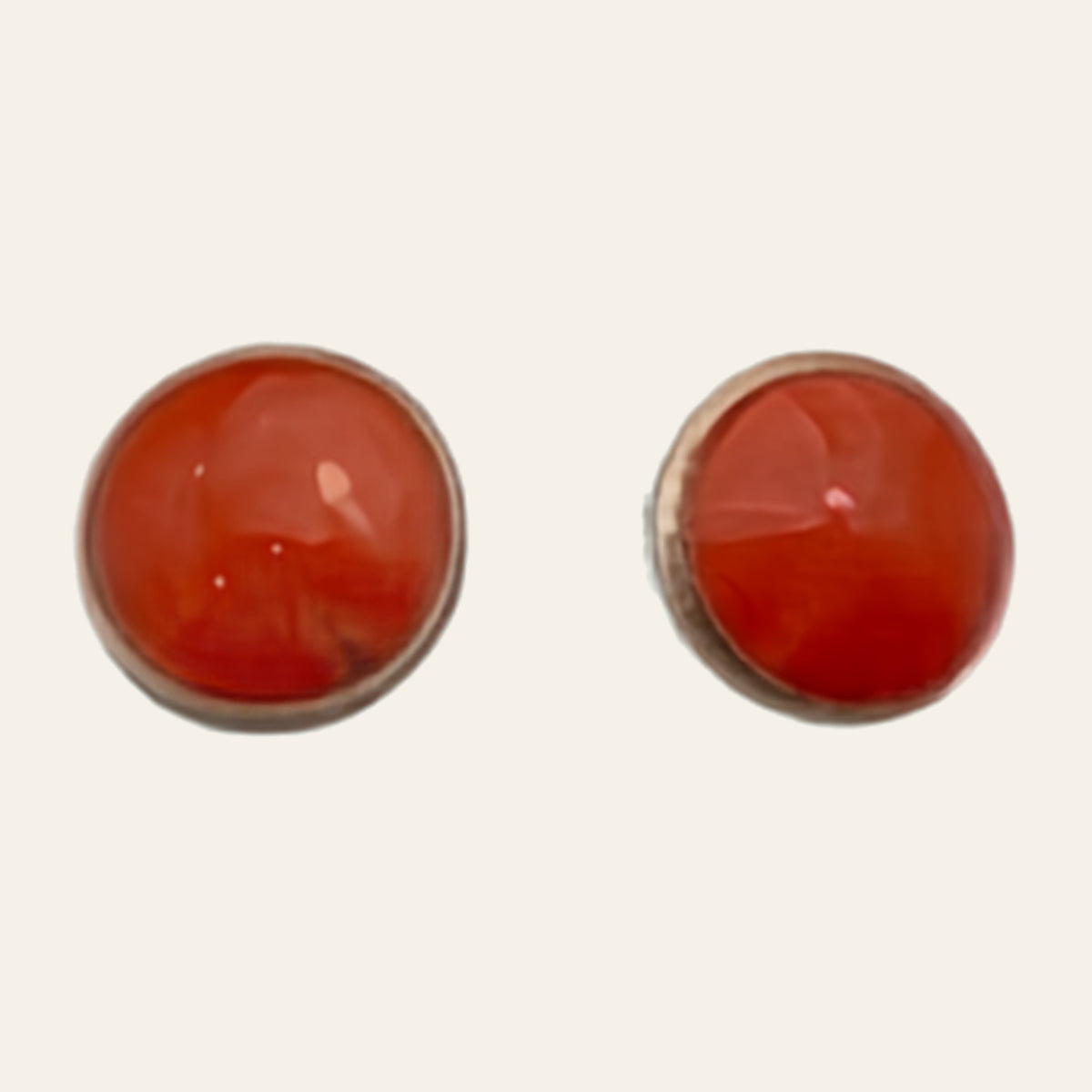 Spiny Oyster Round Stud Earrings in Sterling Silver, Small or Medium, shown on a cream background