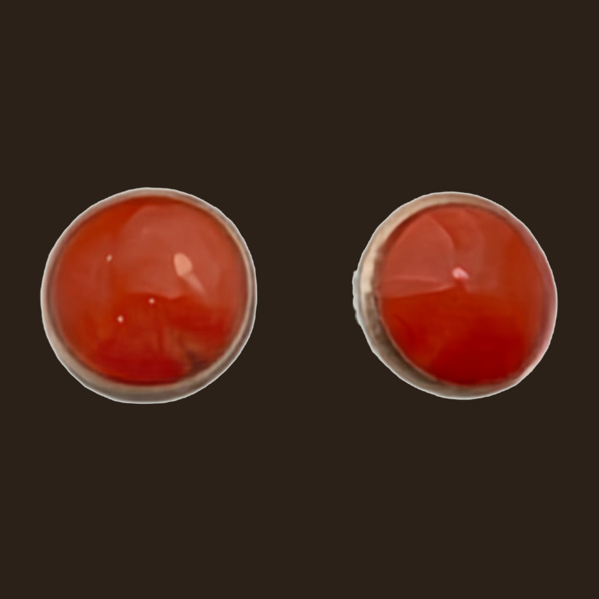 Spiny Oyster Round Stud Earrings in Sterling Silver, Small or Medium, shown on an espresso background