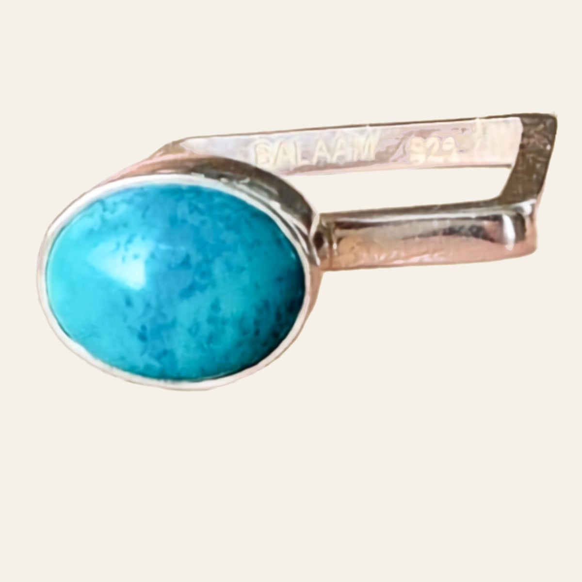 Square Turquoise Ring in Sterling Silver, by BALAAM, Size 5.5, shown on a cream background