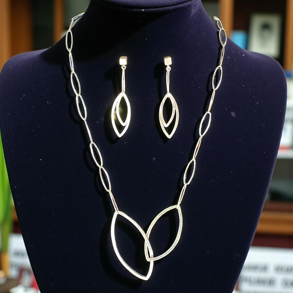 Interleaf Earrings, Sterling Silver Leaf Dangles, by Grace Chin, stone close-up