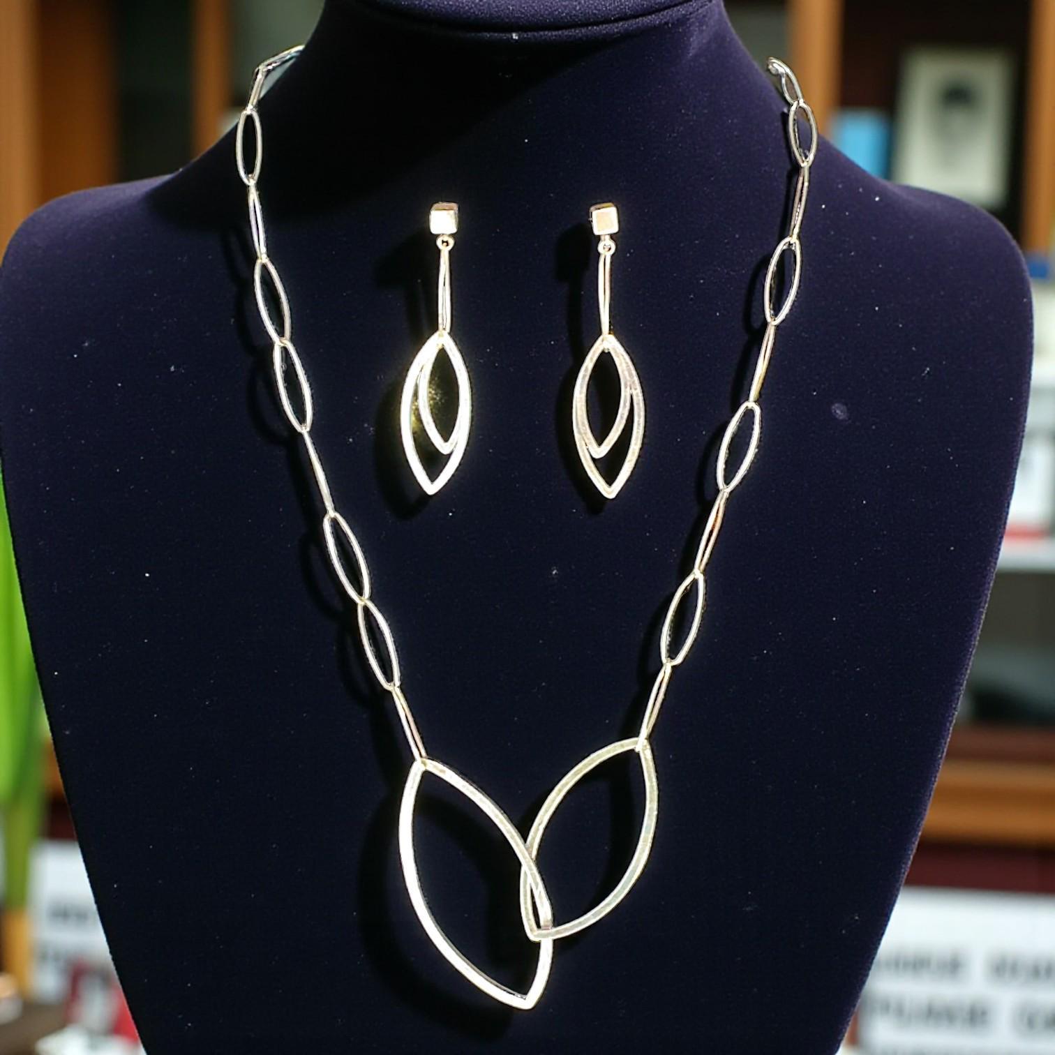 Interleaf Earrings, Sterling Silver Leaf Dangles, by Grace Chin, stone close-up