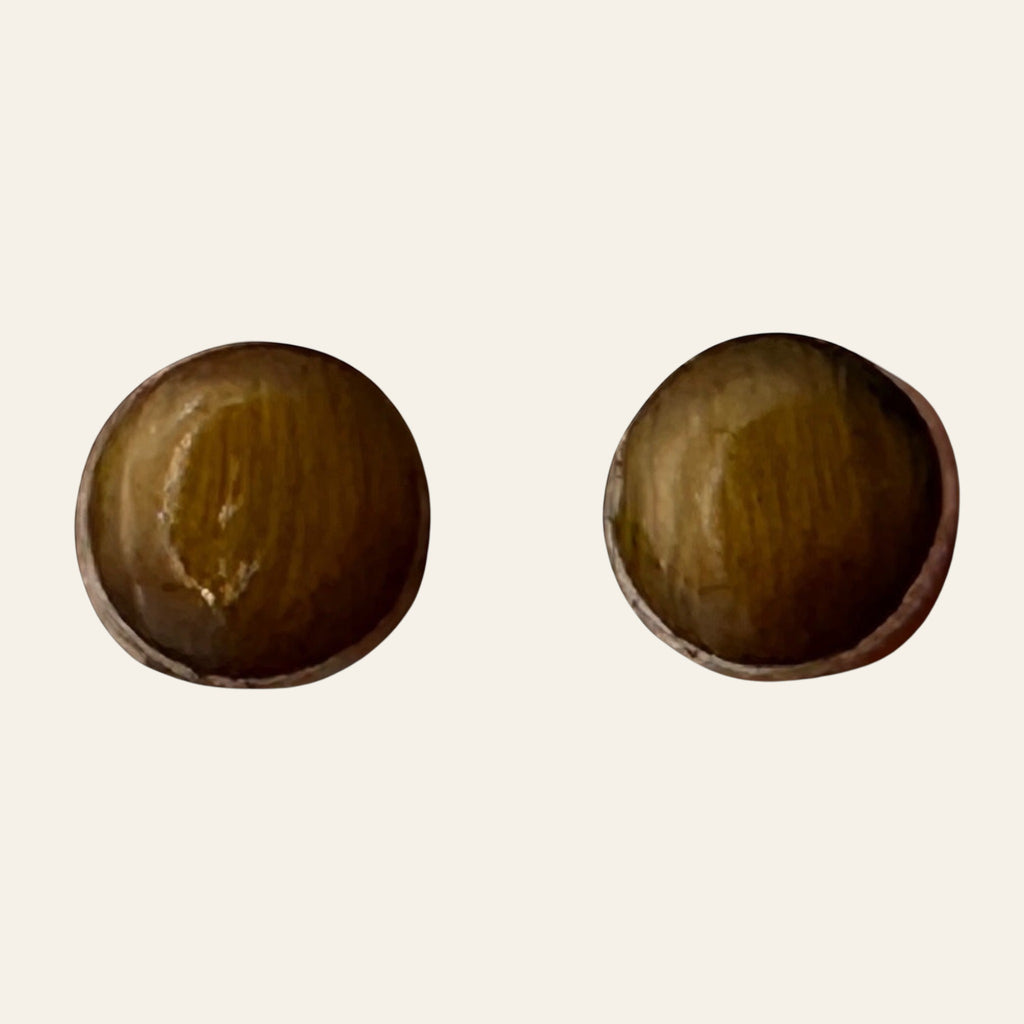 Tiger Eye Round Stud Earrings in Sterling Silver, shown on a cream background